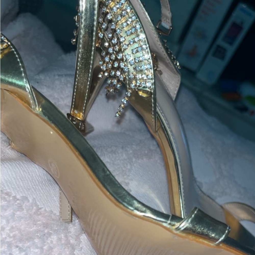 Never worn gold high heels